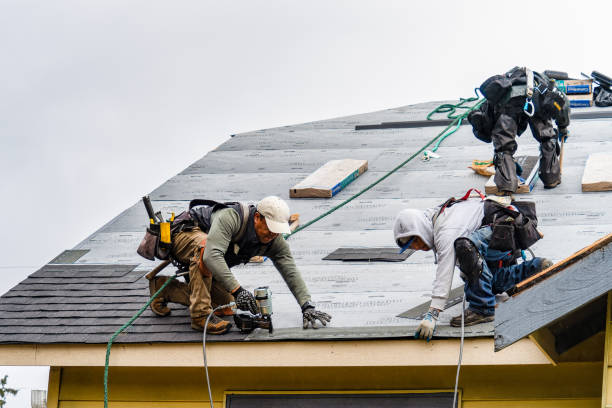 Professional Gutter Installation technician working in Melbourne, IA